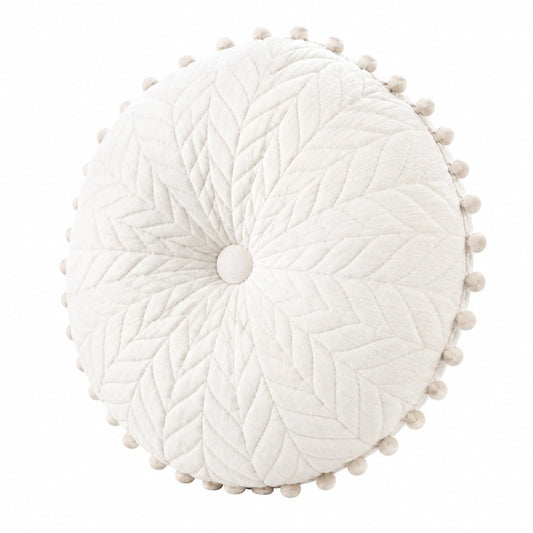 Coussin décoratif rond 45 cm en tissu écru matelassé à pompons style bohème